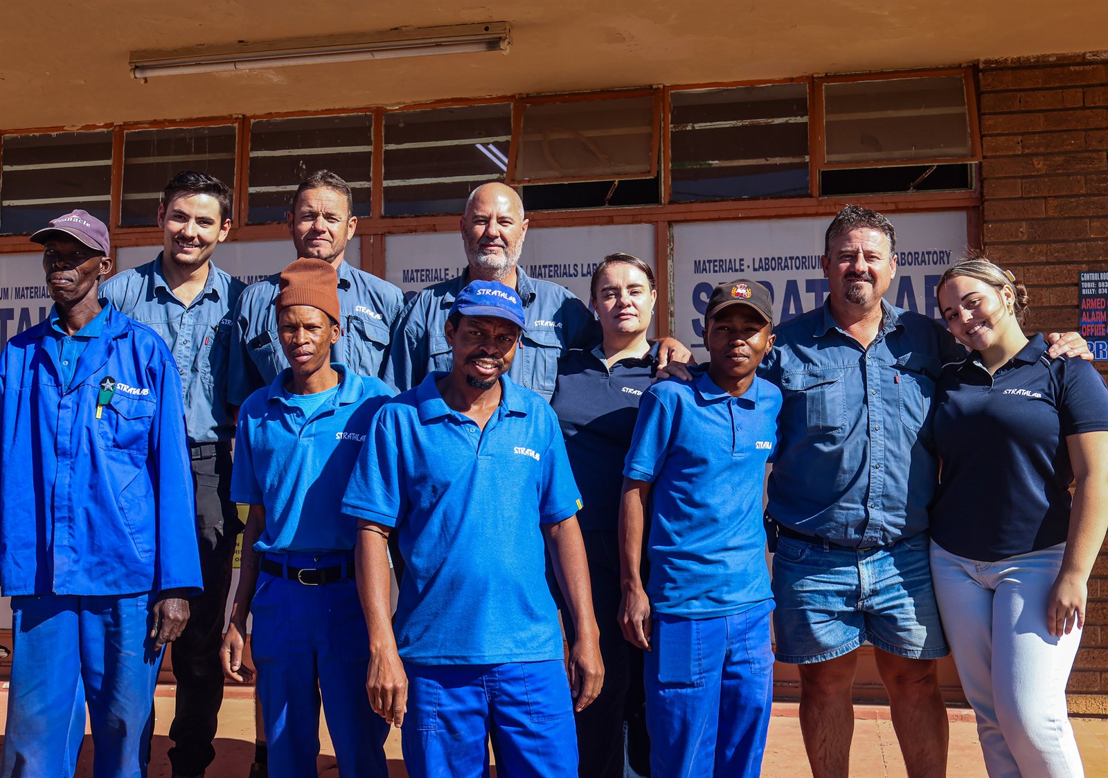 Stratalab Klerksdorp team standing together outside the laboratory