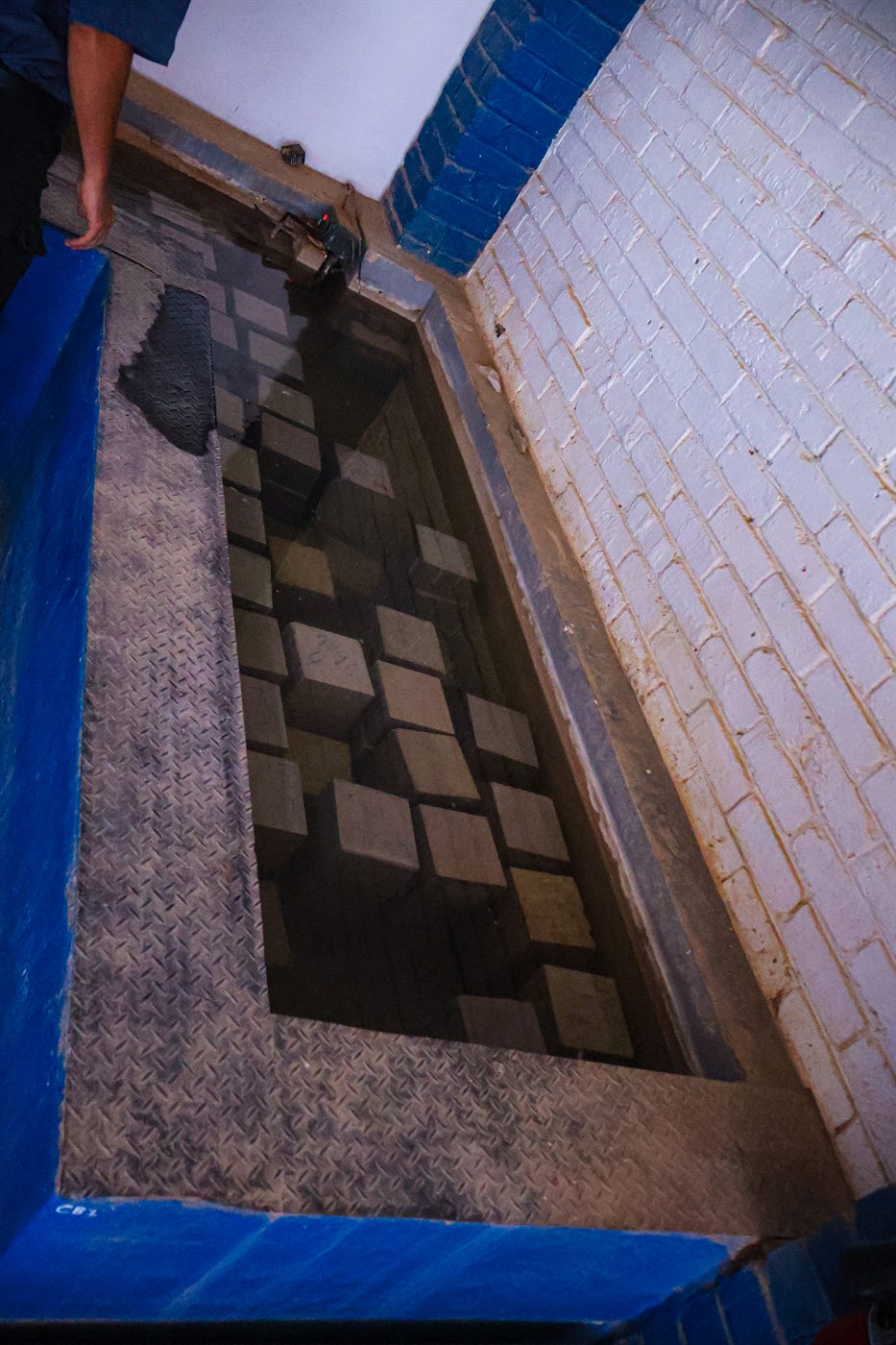 Concrete cubes curing in a water bath